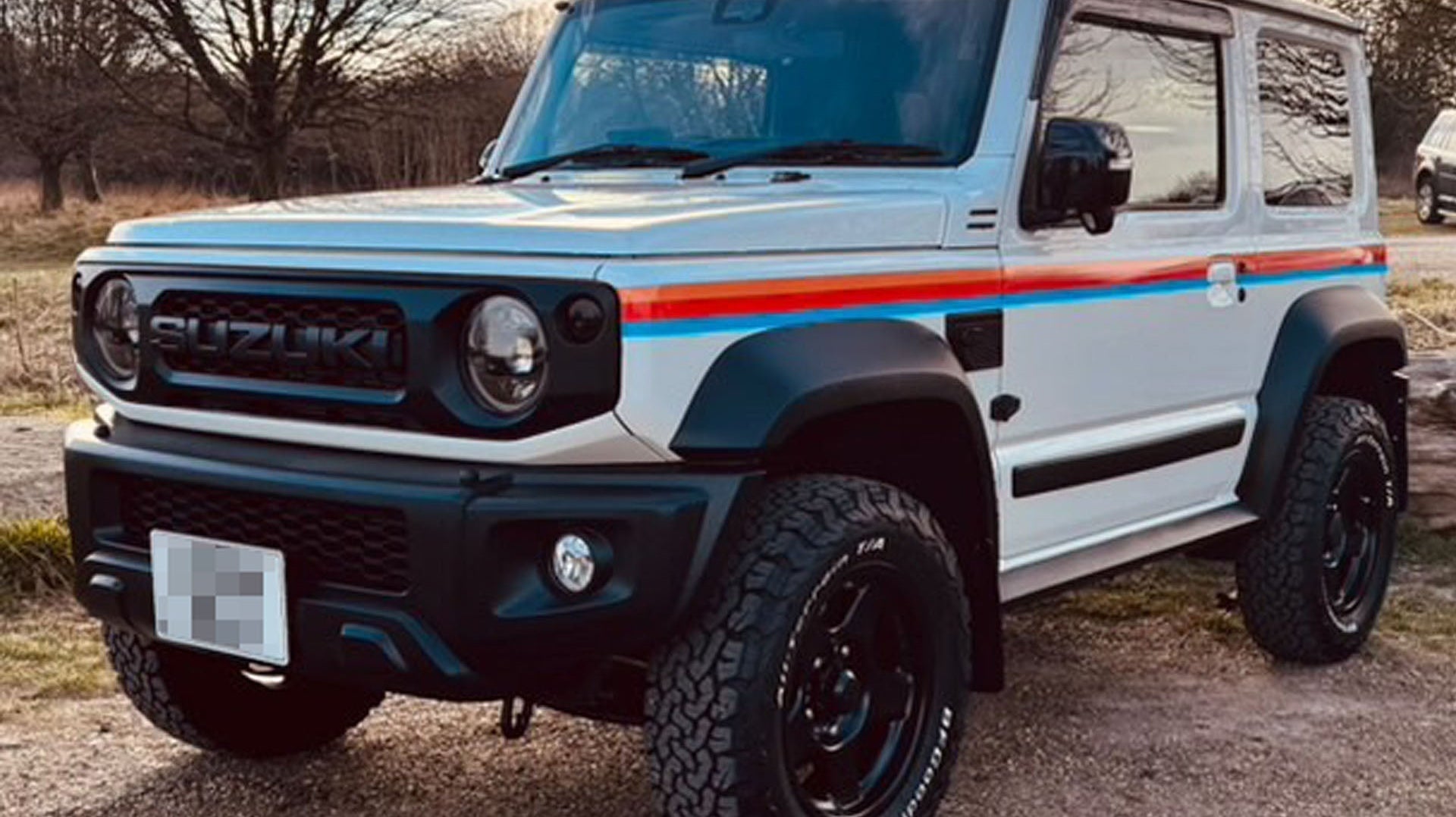 White Jimny fitted with 16" Matte Black BRADLEY V wheels and a variety of accessories