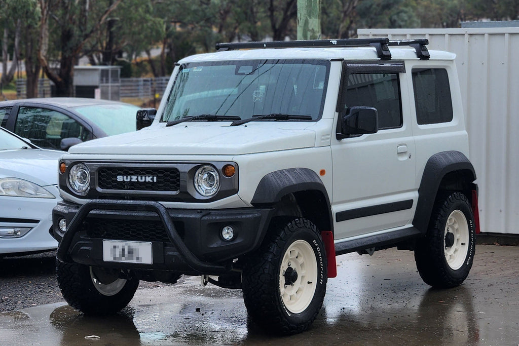 Suzuki Jimny (2018+) fitted with Vintage White High Peak J-01 Wheels