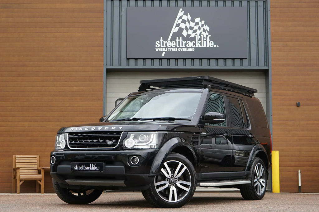 Black 2016 Land Rover Discovery 4 with Front Runner Slimline II Roof Rack and Rear Ladder. All installed at our Holmes Chapel workshop